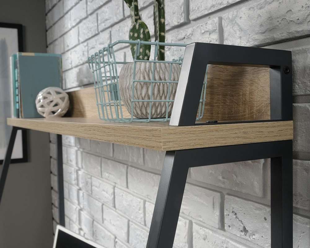 a shelf with a basket on top of it