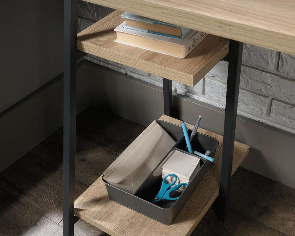 a desk with a drawer with a pair of scissors in it