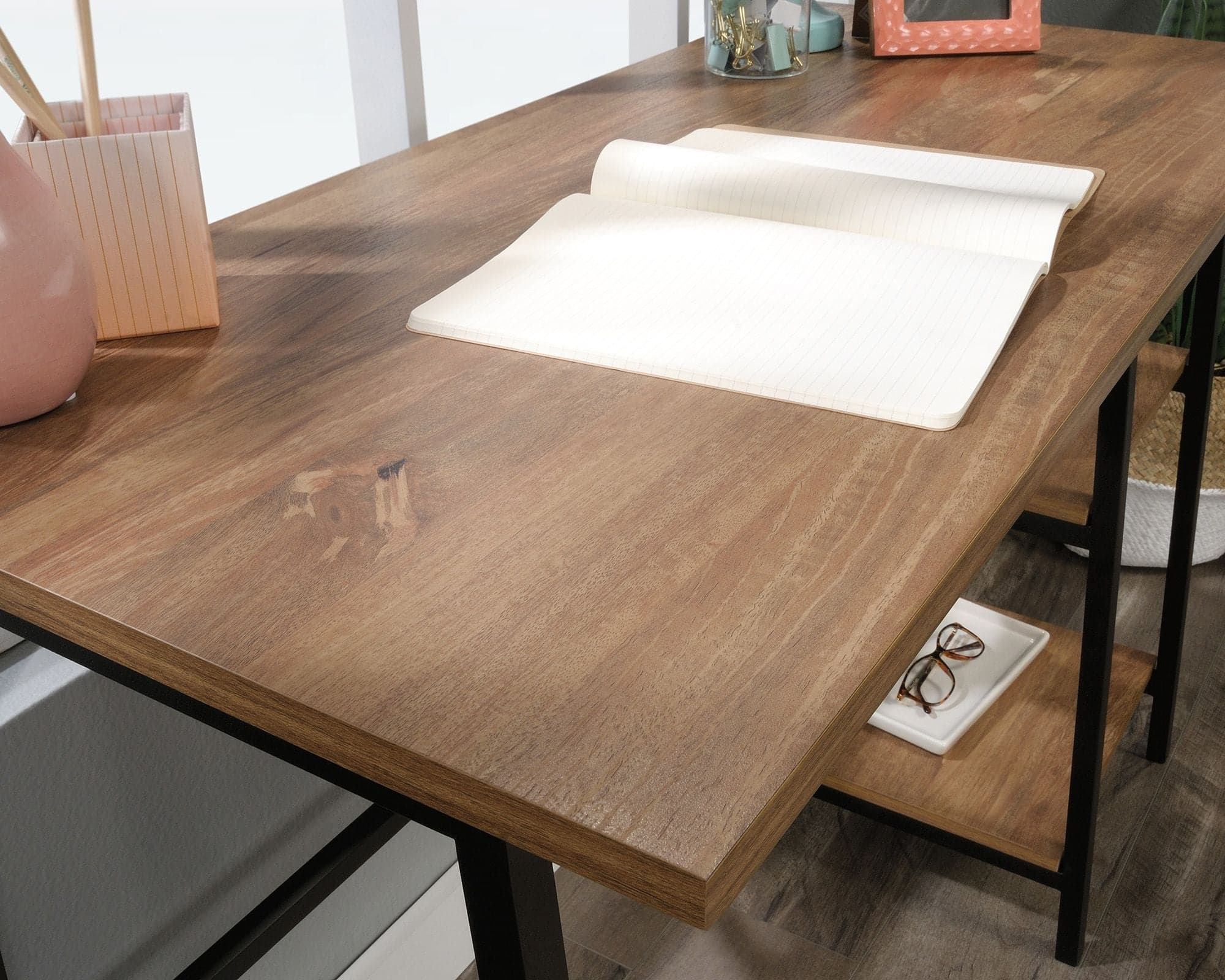 a wooden table with a pair of glasses on top of it