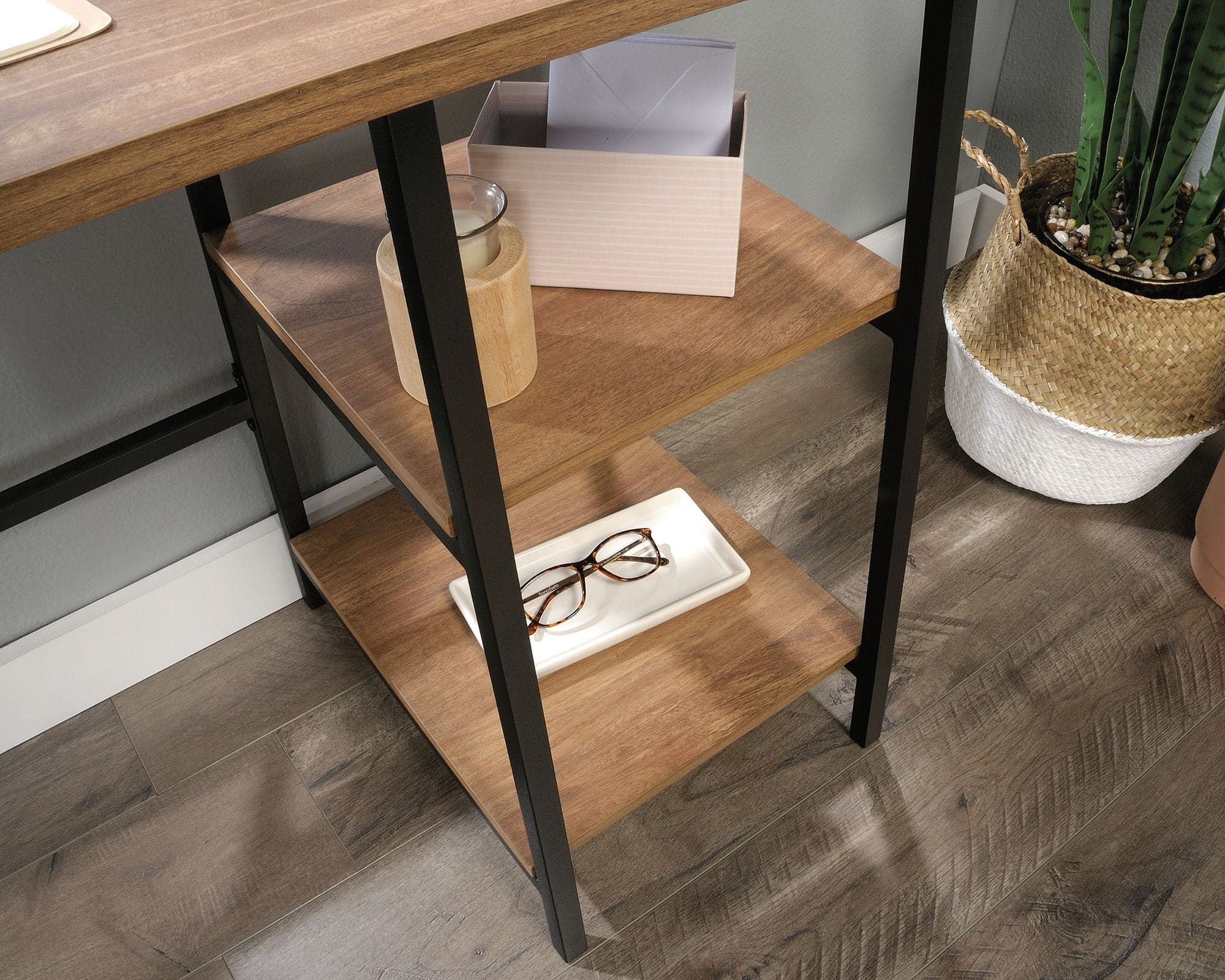 a wooden shelf with a pair of glasses on top of it