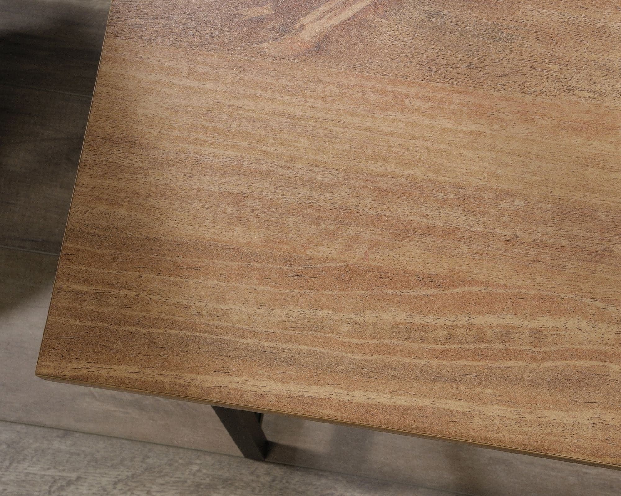 a close up of a wooden table with metal legs