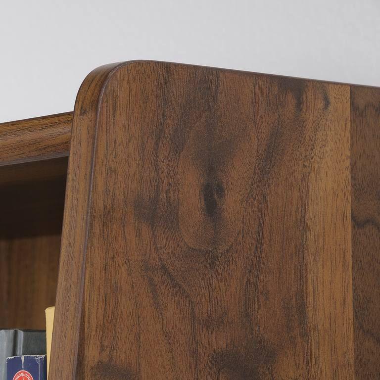 a close up of a book shelf with books