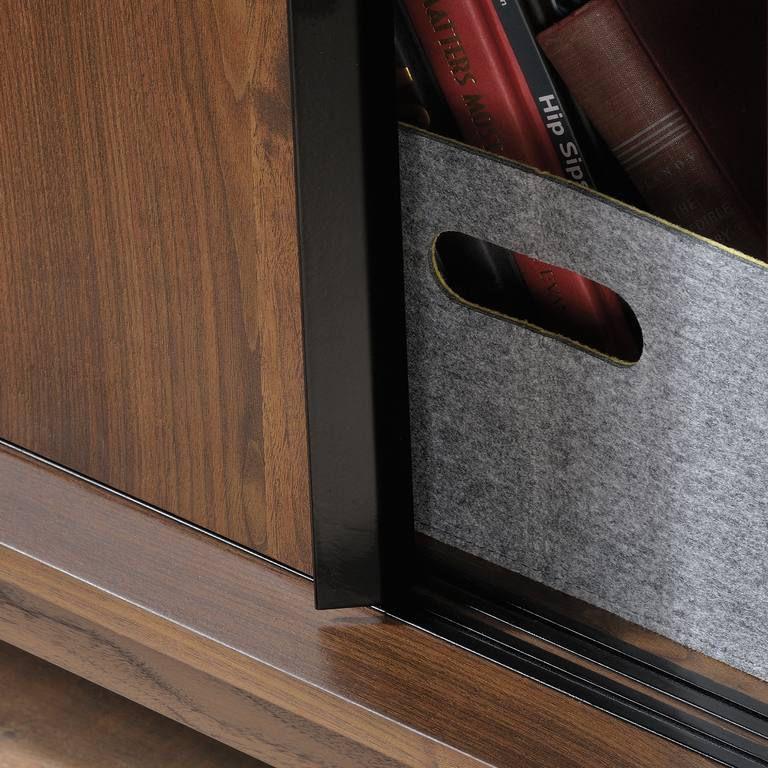 a close up of a drawer with books in it