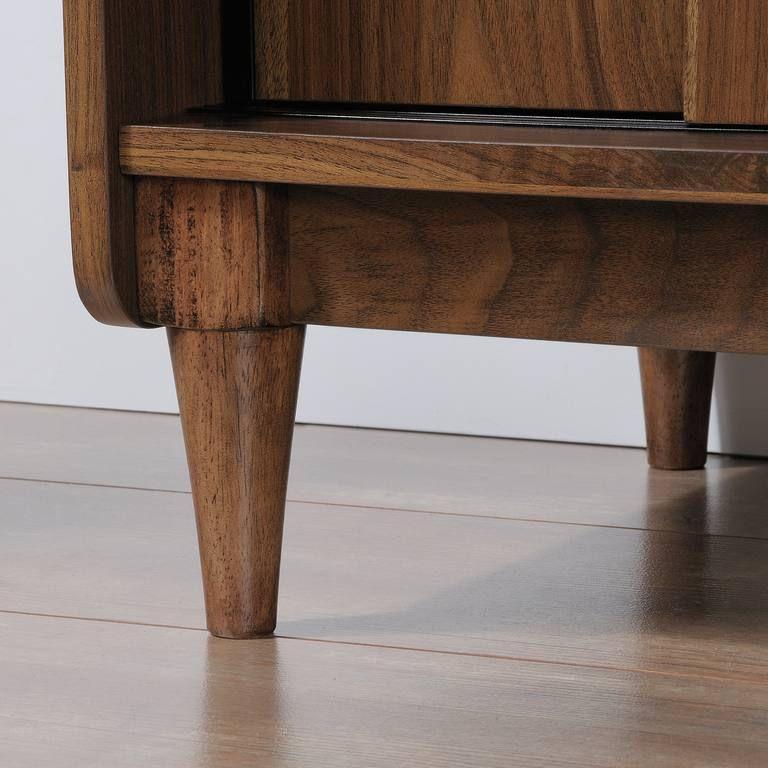 a close up of a wooden table on a hard wood floor