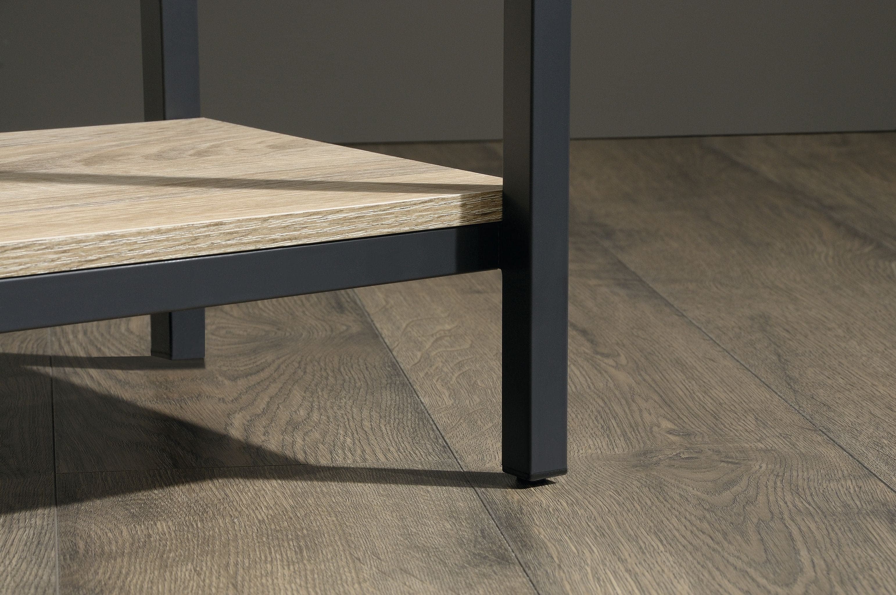 a wooden table sitting on top of a hard wood floor