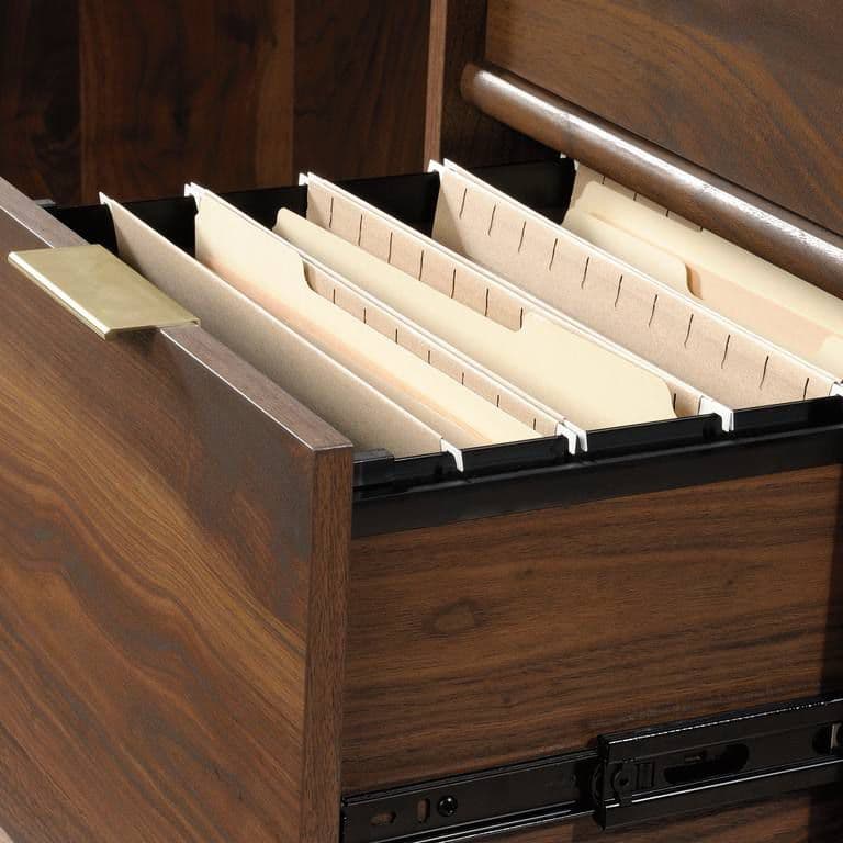 a file cabinet with a drawer full of files