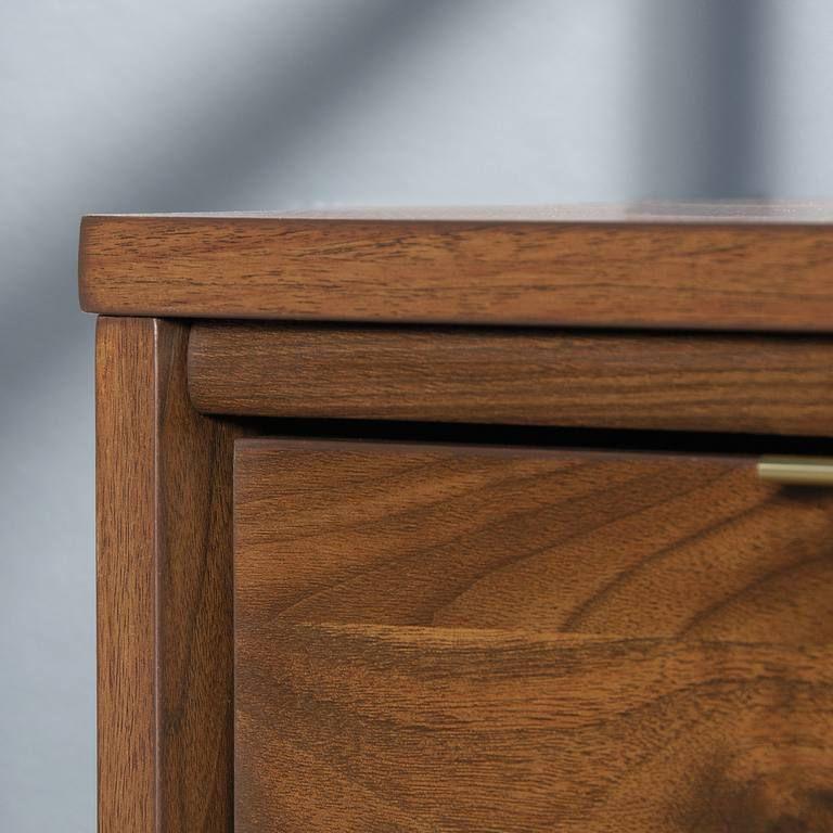 a close up of a wooden dresser drawer