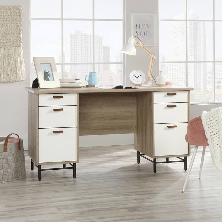 a desk with two drawers and a clock on top of it