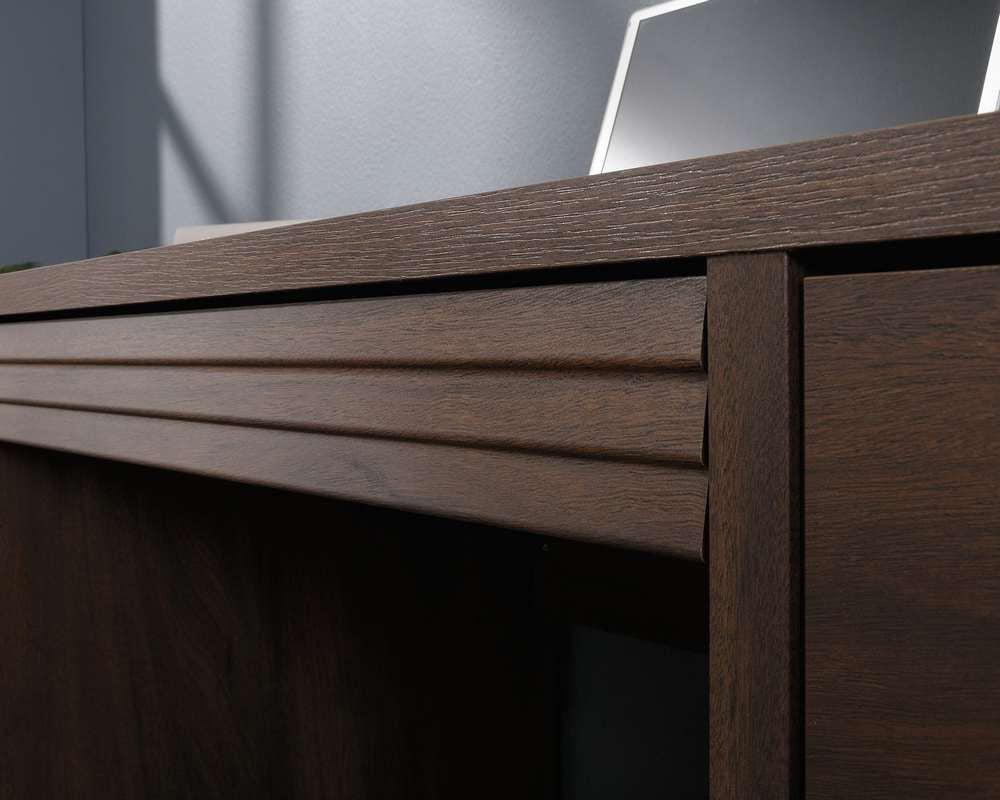 a close up of a wooden shelf with a laptop on top of it