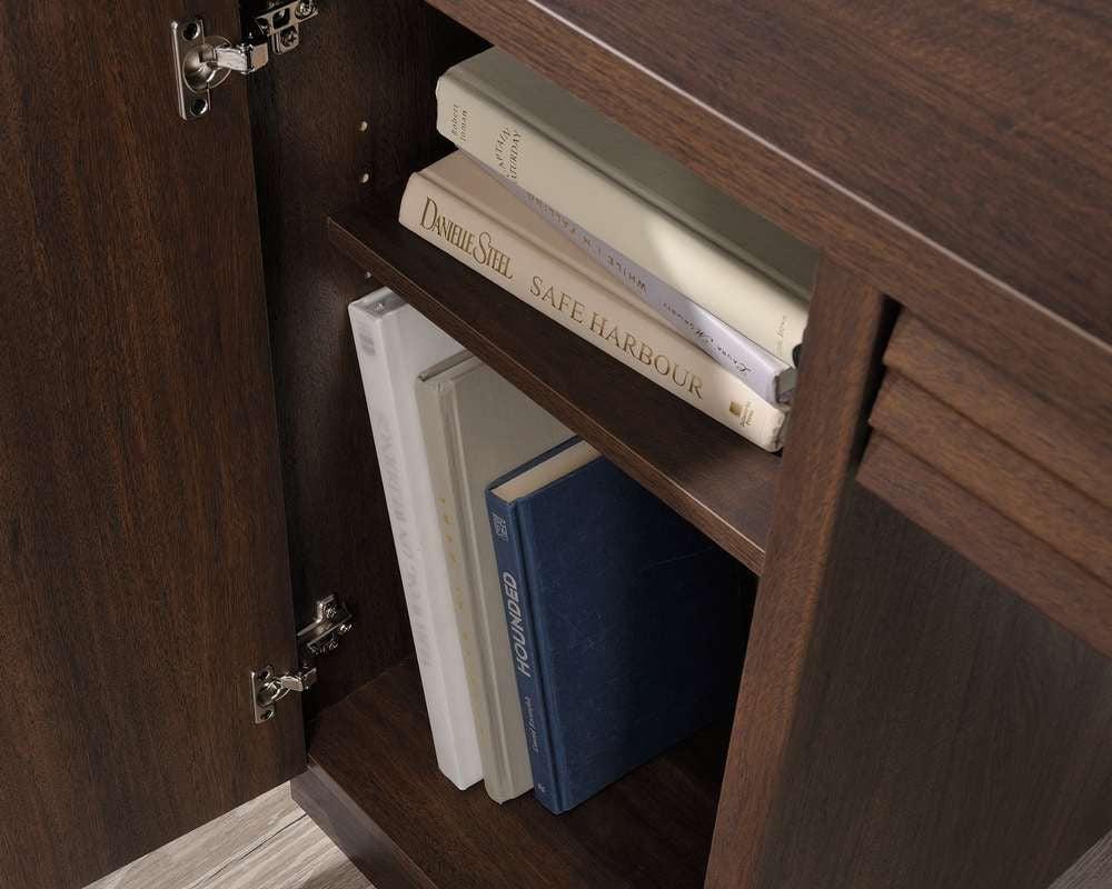 a close up of a book shelf with books