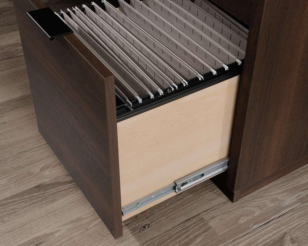 a file cabinet with a drawer full of files