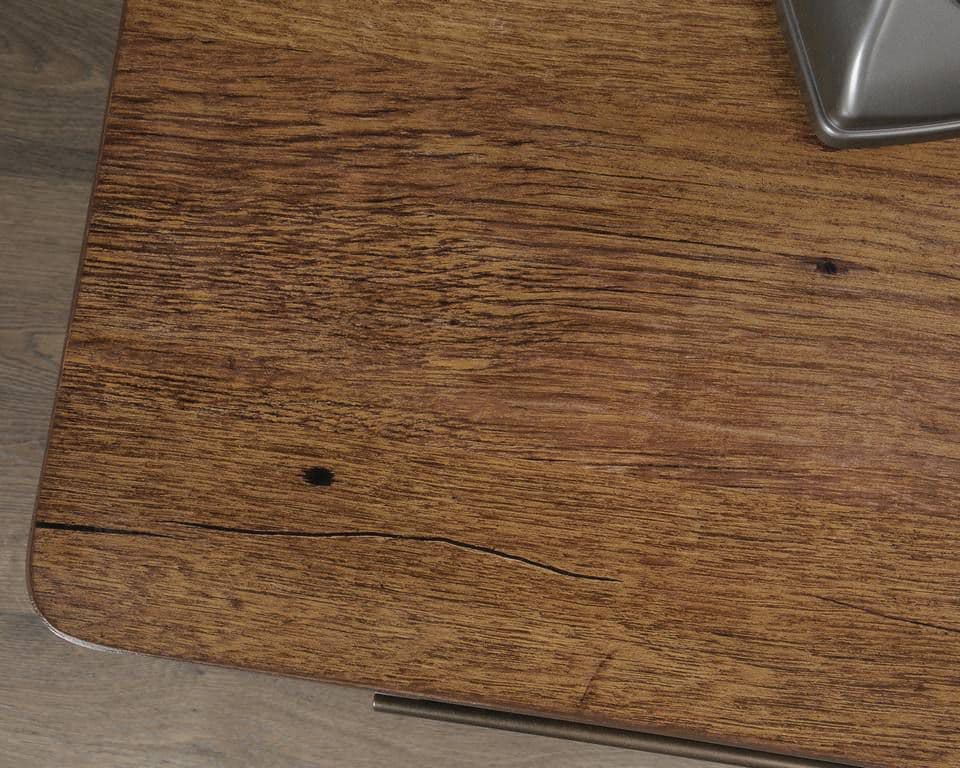 a close up of a wooden surface with a computer mouse