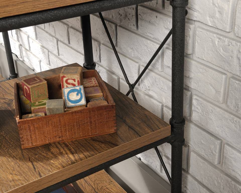 a wooden box filled with blocks on top of a wooden table