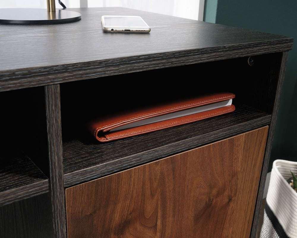 a wooden cabinet with a laptop on top of it