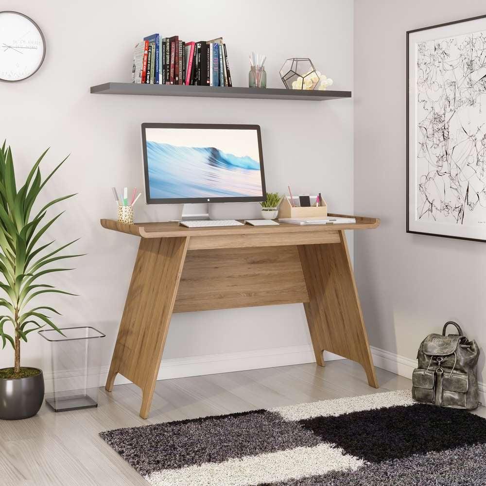 a wooden desk with a computer on top of it