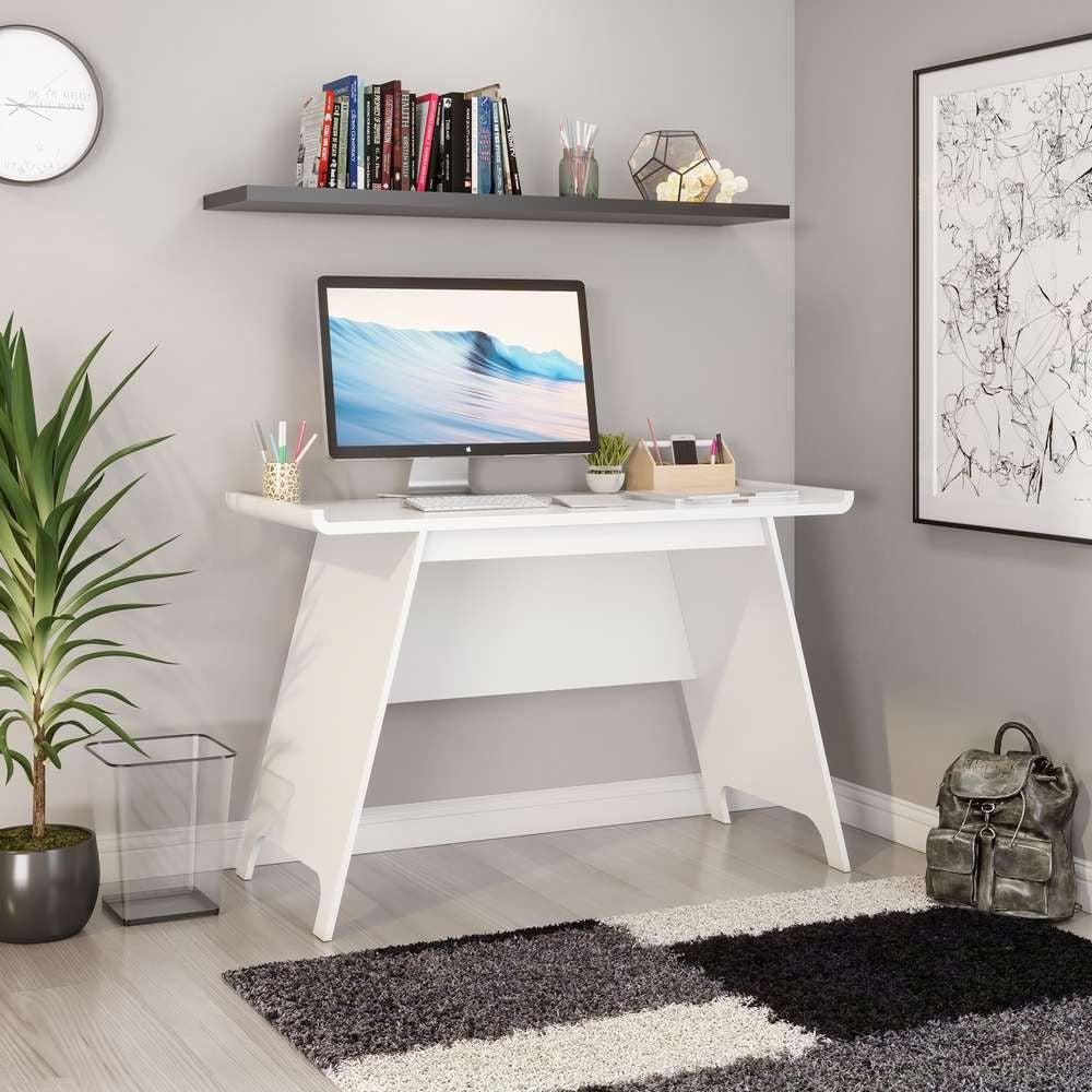 a white desk with a computer on top of it