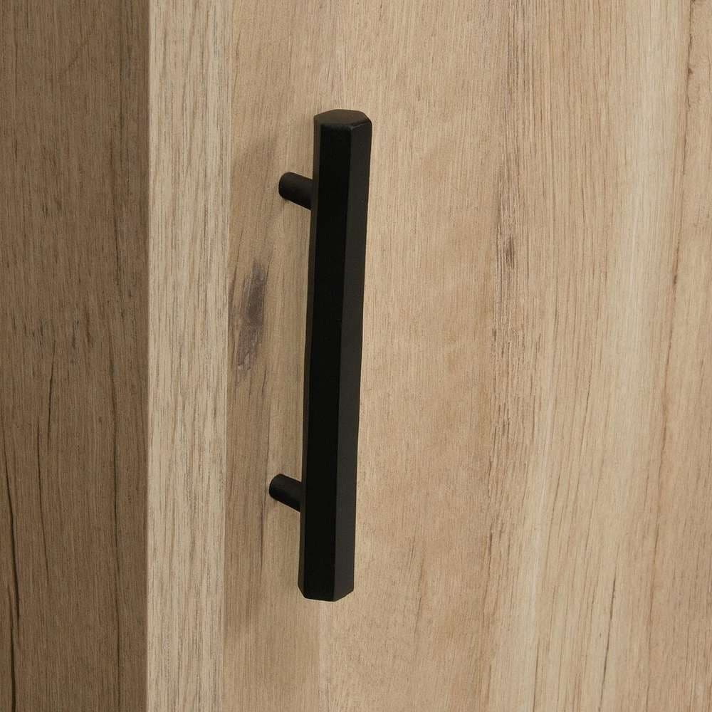 a close up of a door handle on a wooden door