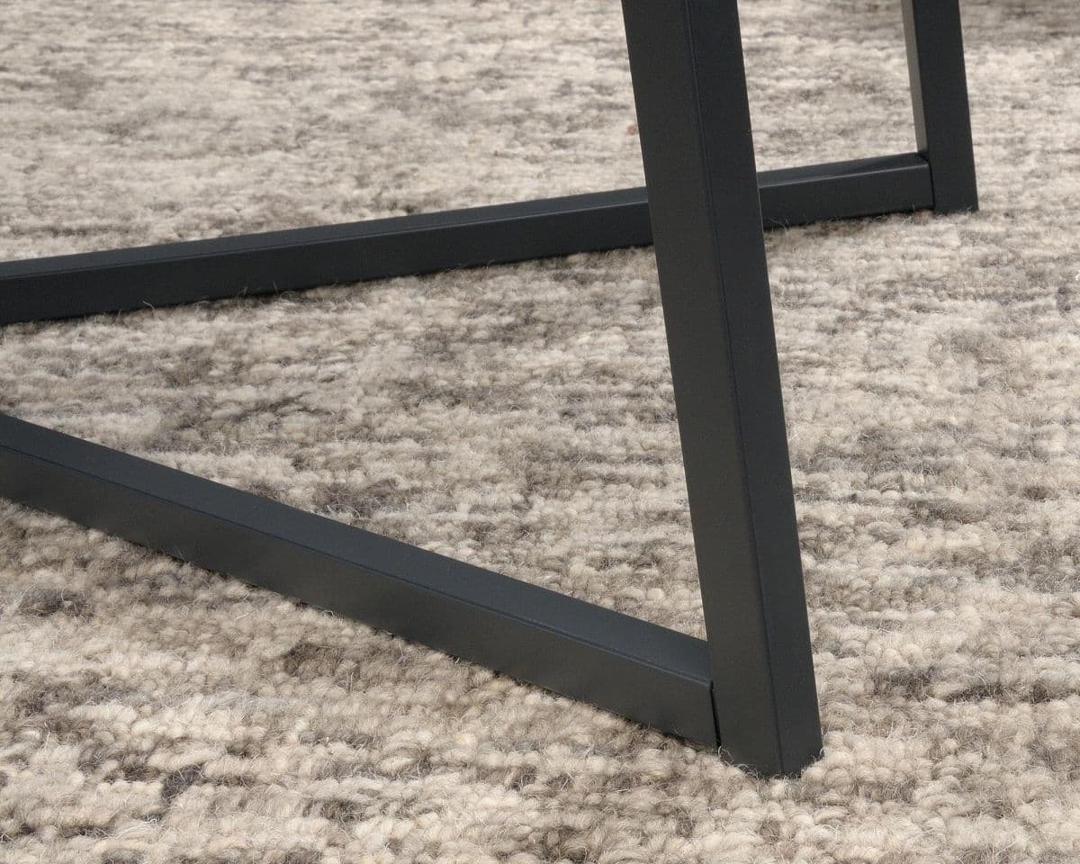 a close up of a table on a carpeted floor