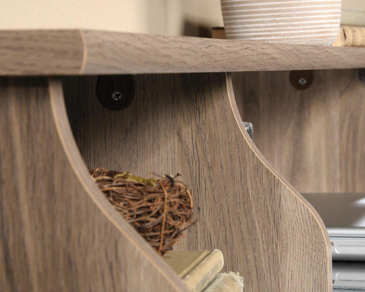 a close up of a shelf with a bird nest