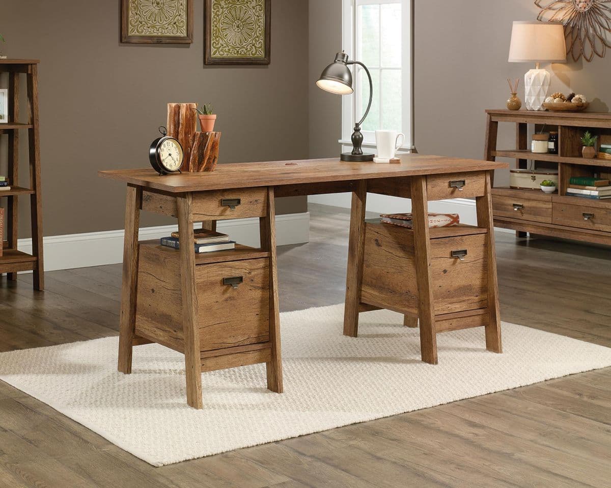 a wooden desk sitting on top of a hard wood floor