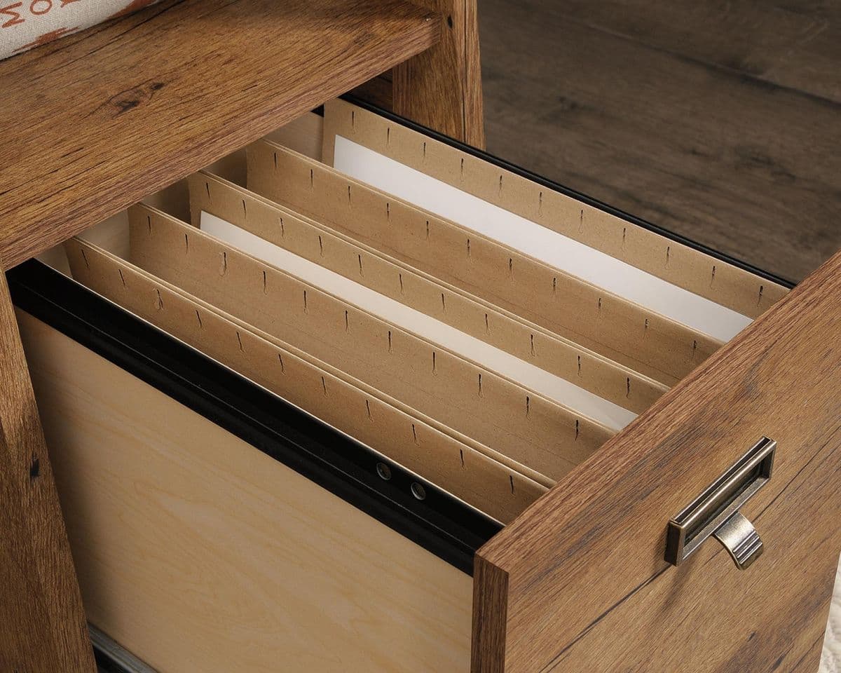 a file cabinet with a drawer full of files