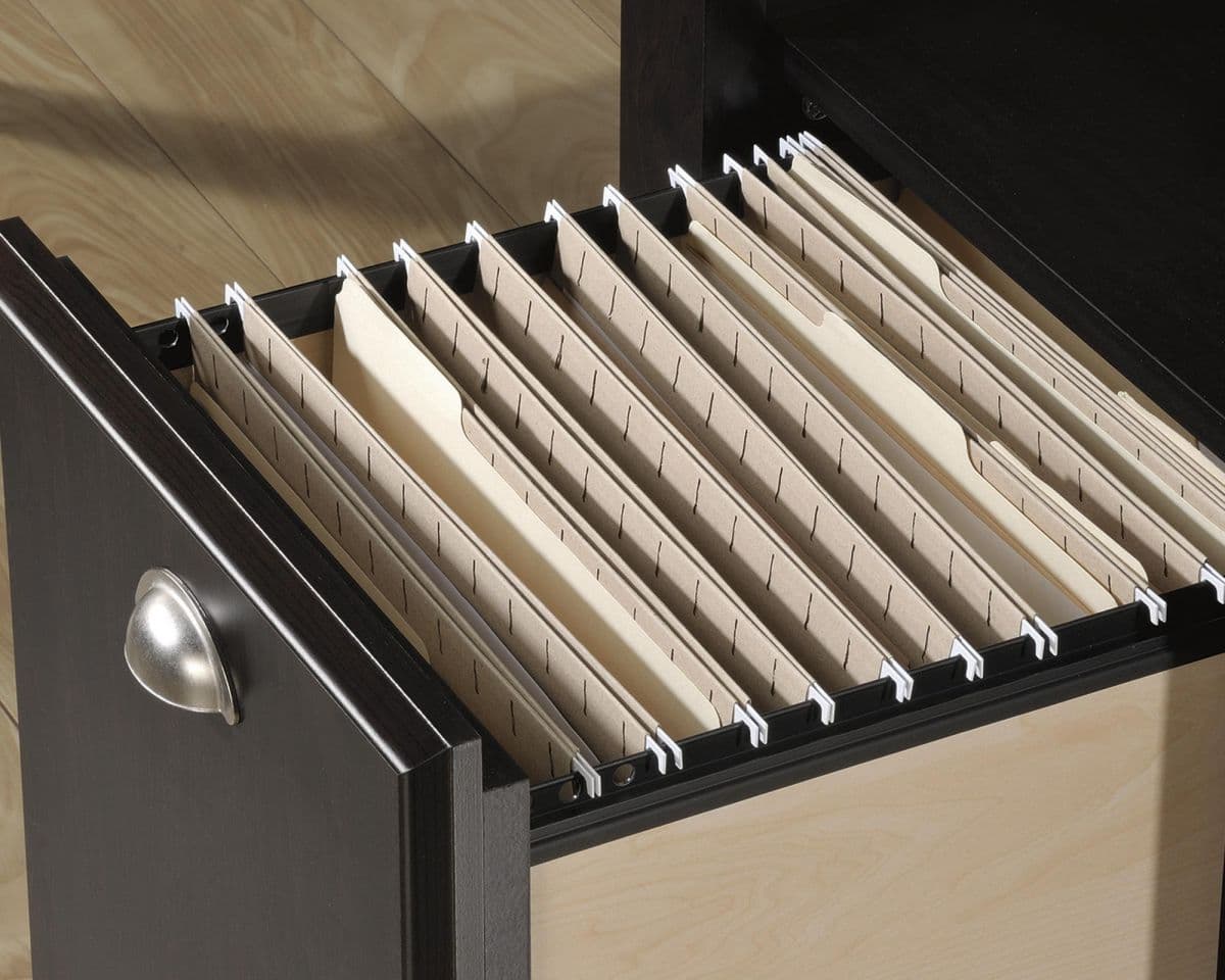 a file cabinet with a drawer full of files