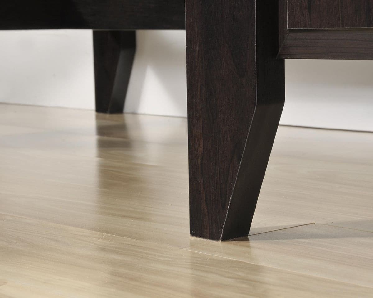 a close up of a wooden table on a hard wood floor