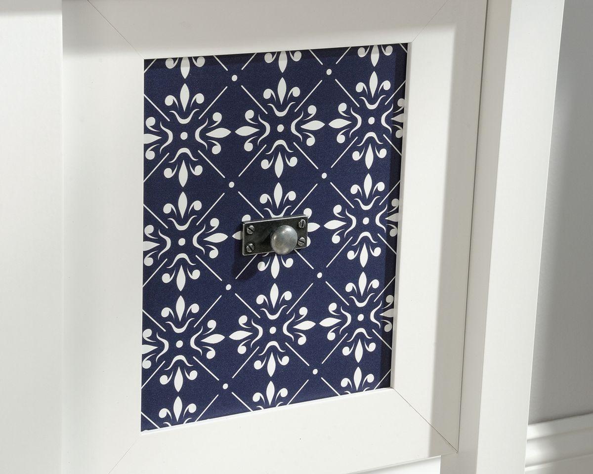 a white frame with a blue and white pattern on it