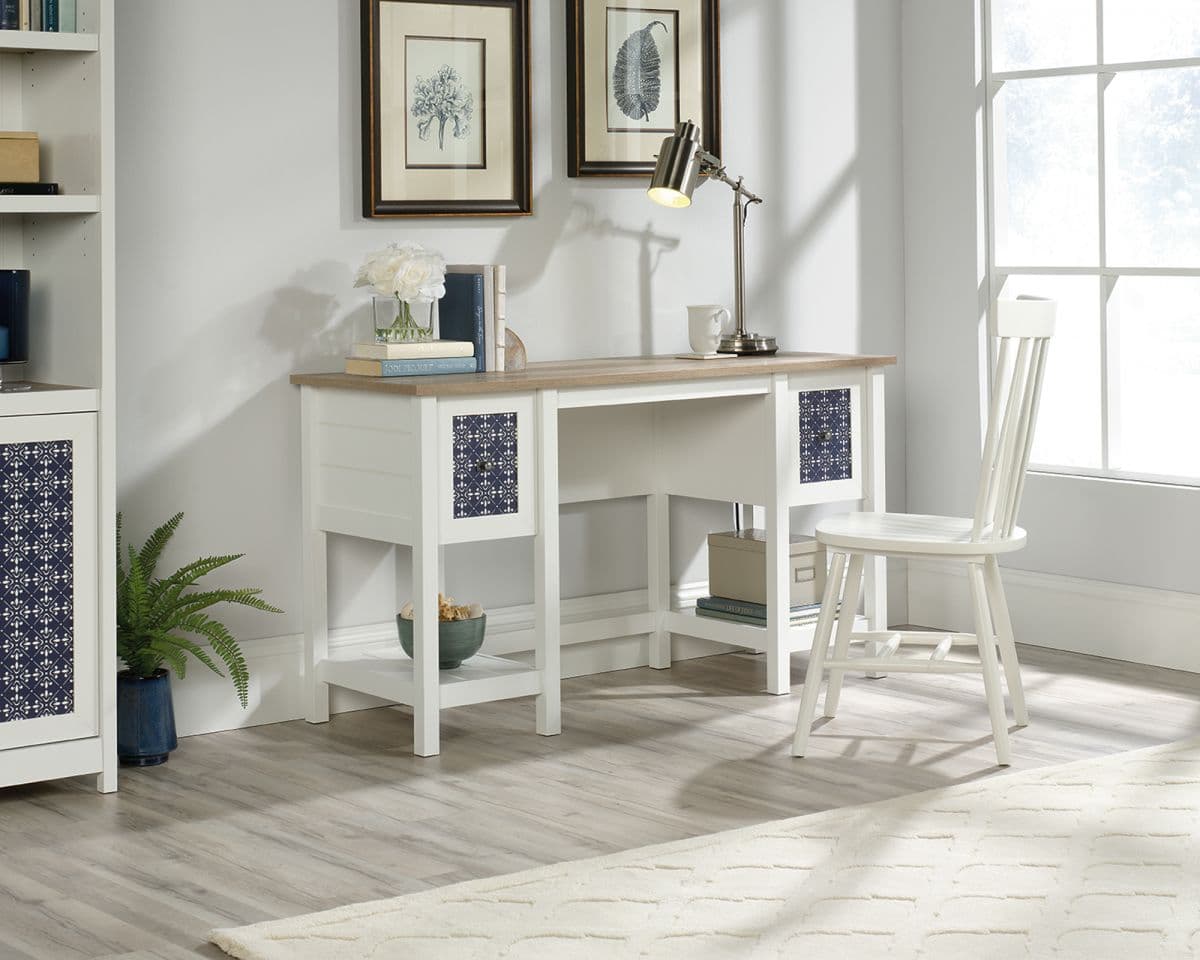 a white desk and chair in a room