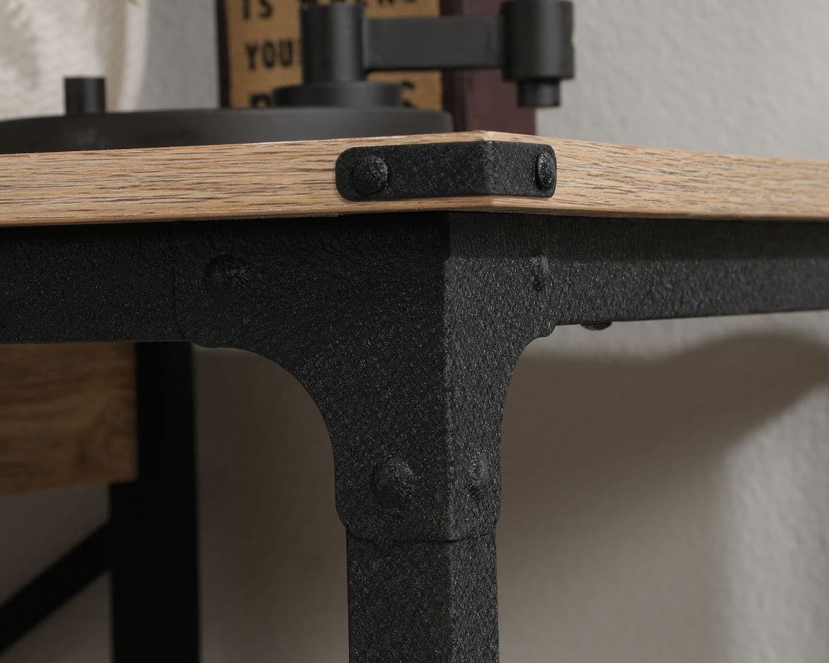 a close up of a wooden table with metal legs