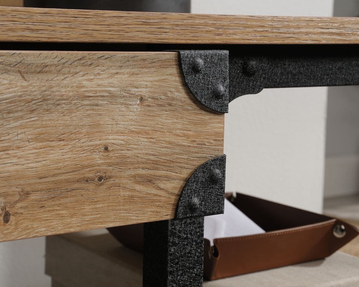 a close up of a wooden table with a leather strap