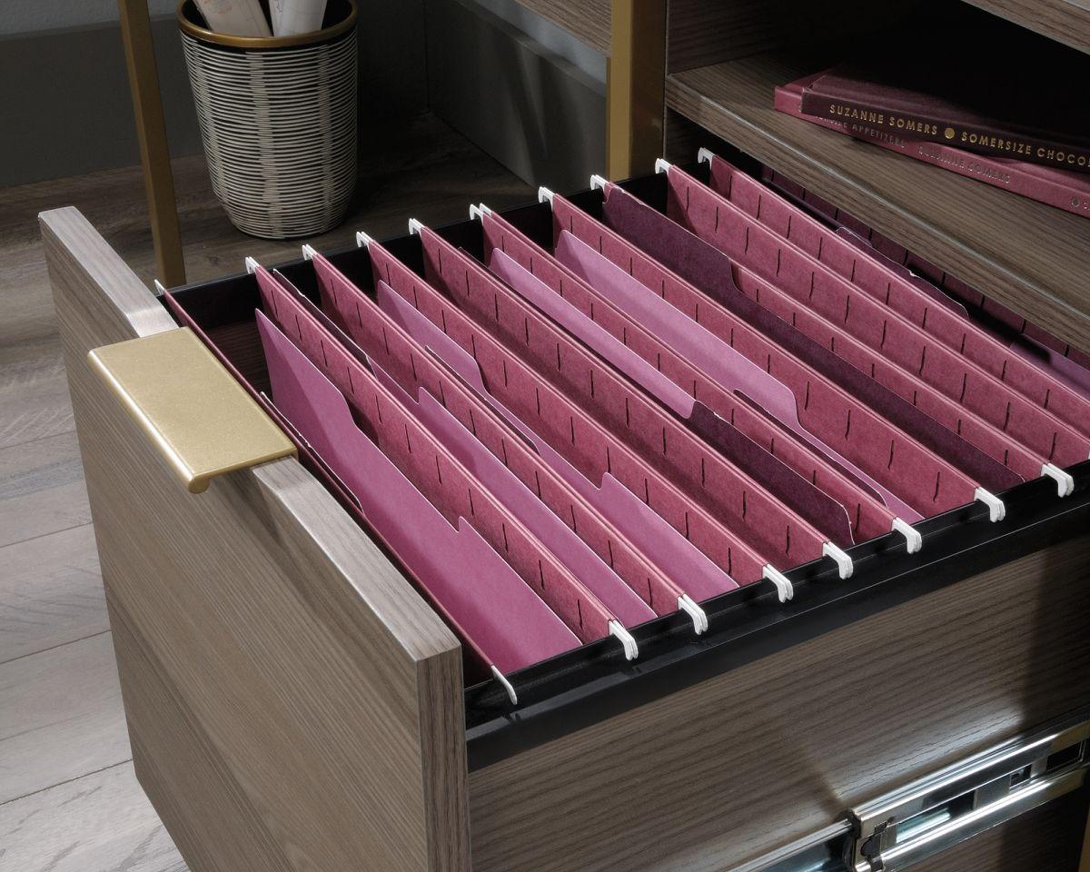 a drawer that has a bunch of files in it