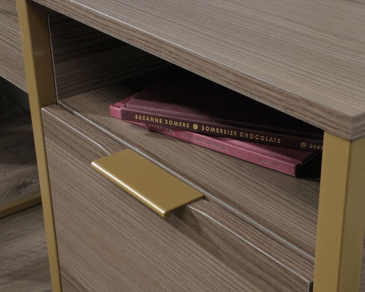 a close up of a drawer with books on it