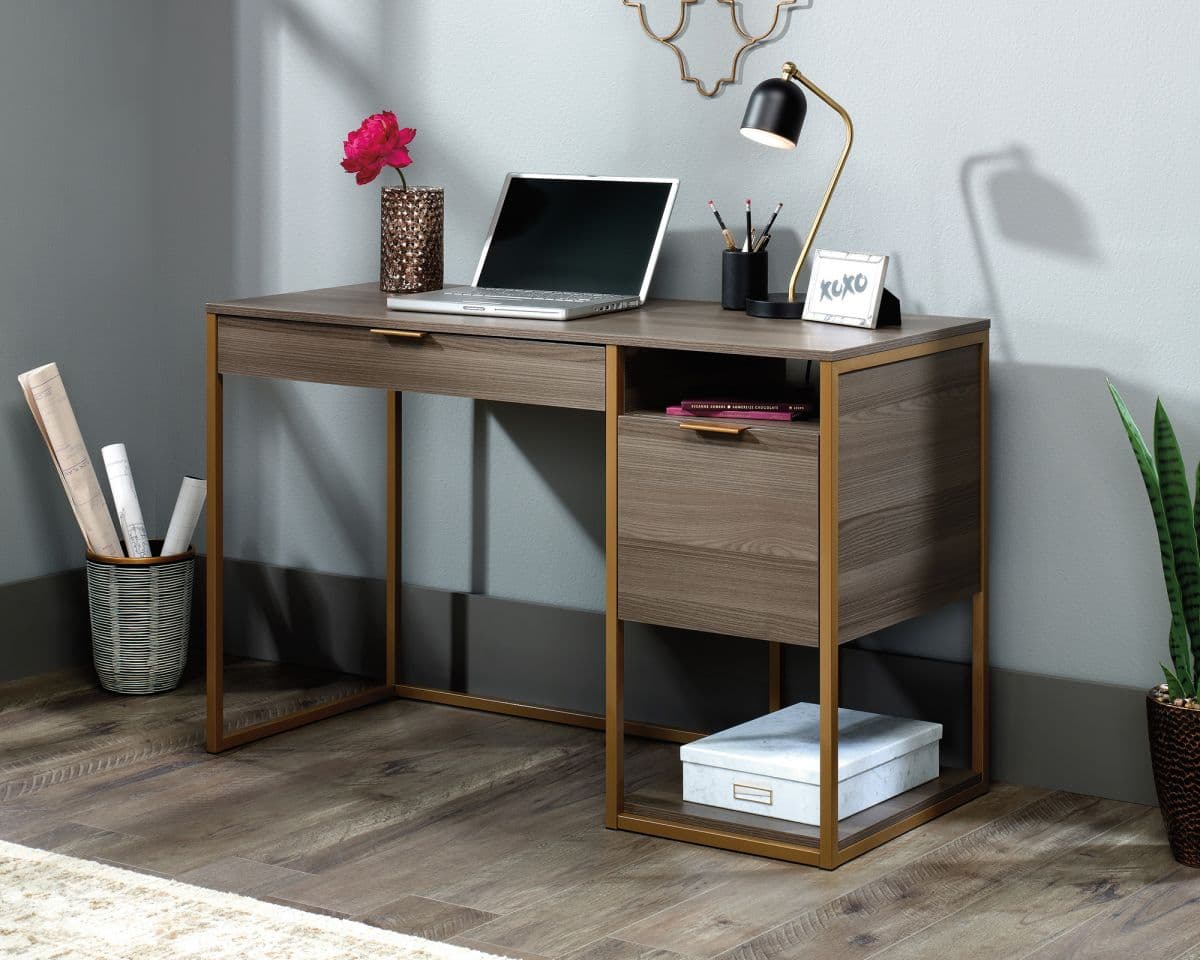 a wooden desk with a laptop on top of it