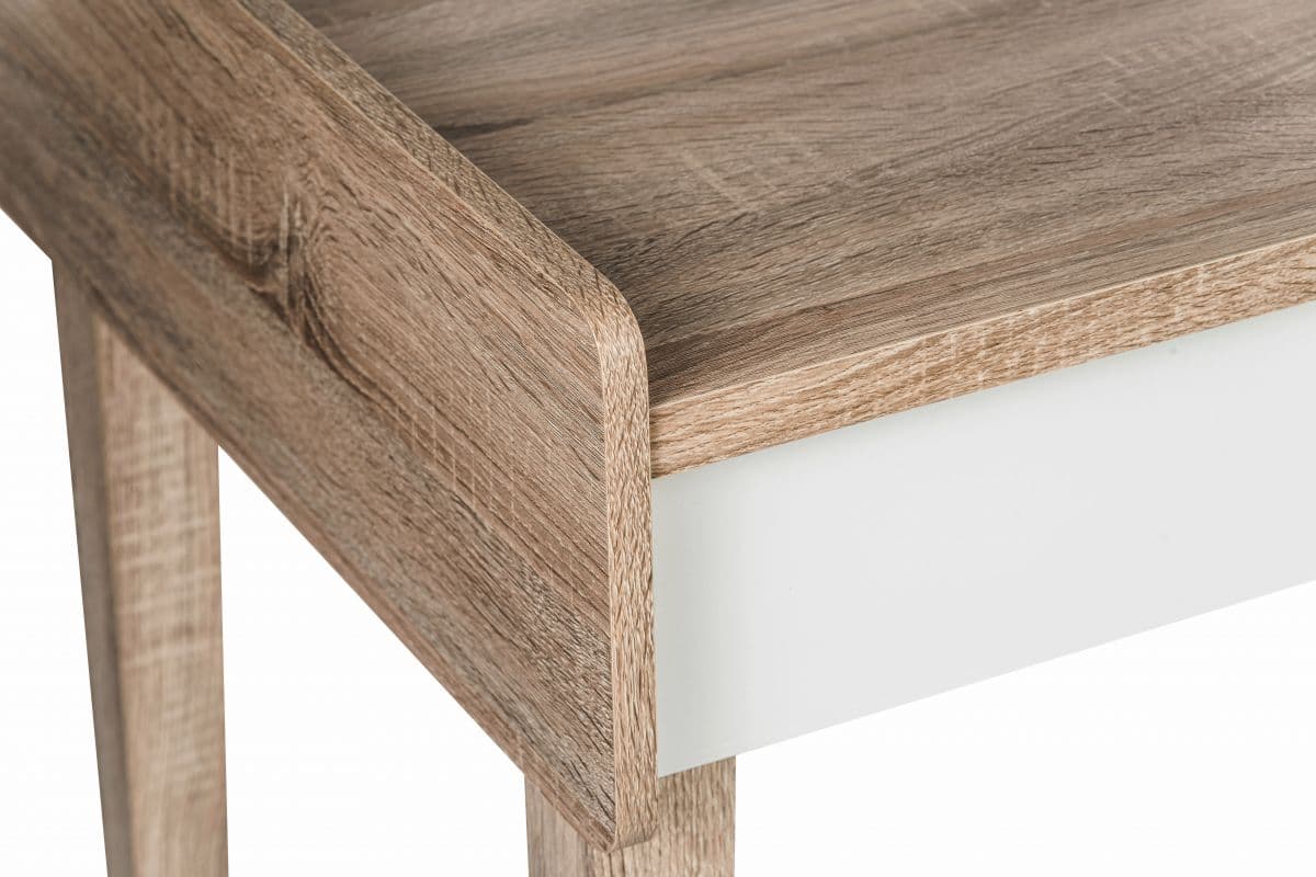 a close up of a wooden table with white legs