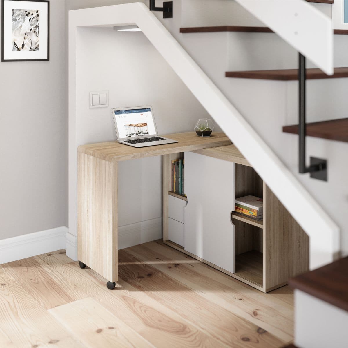 a laptop computer sitting on top of a wooden desk