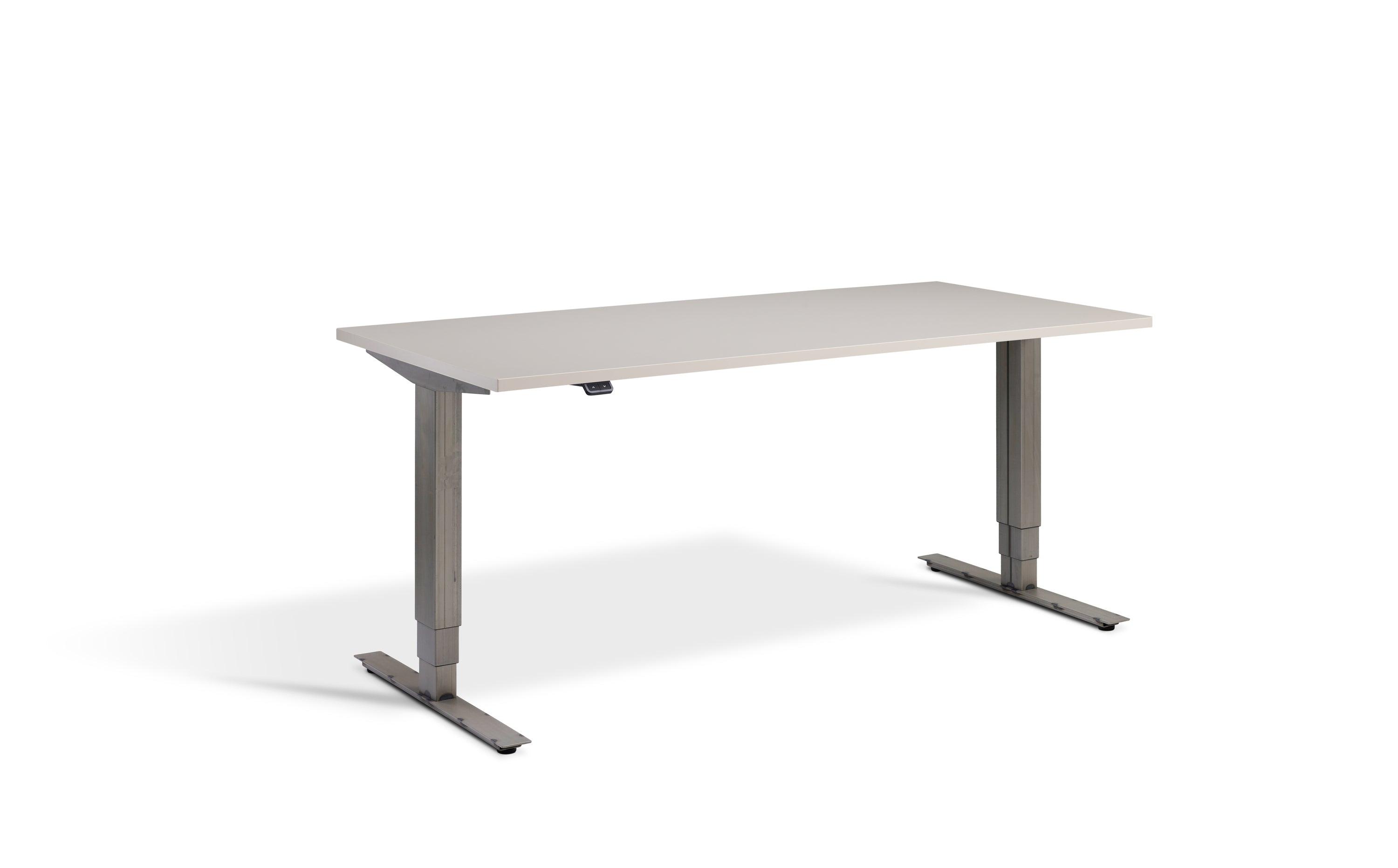 a white desk with a metal leg and a white top