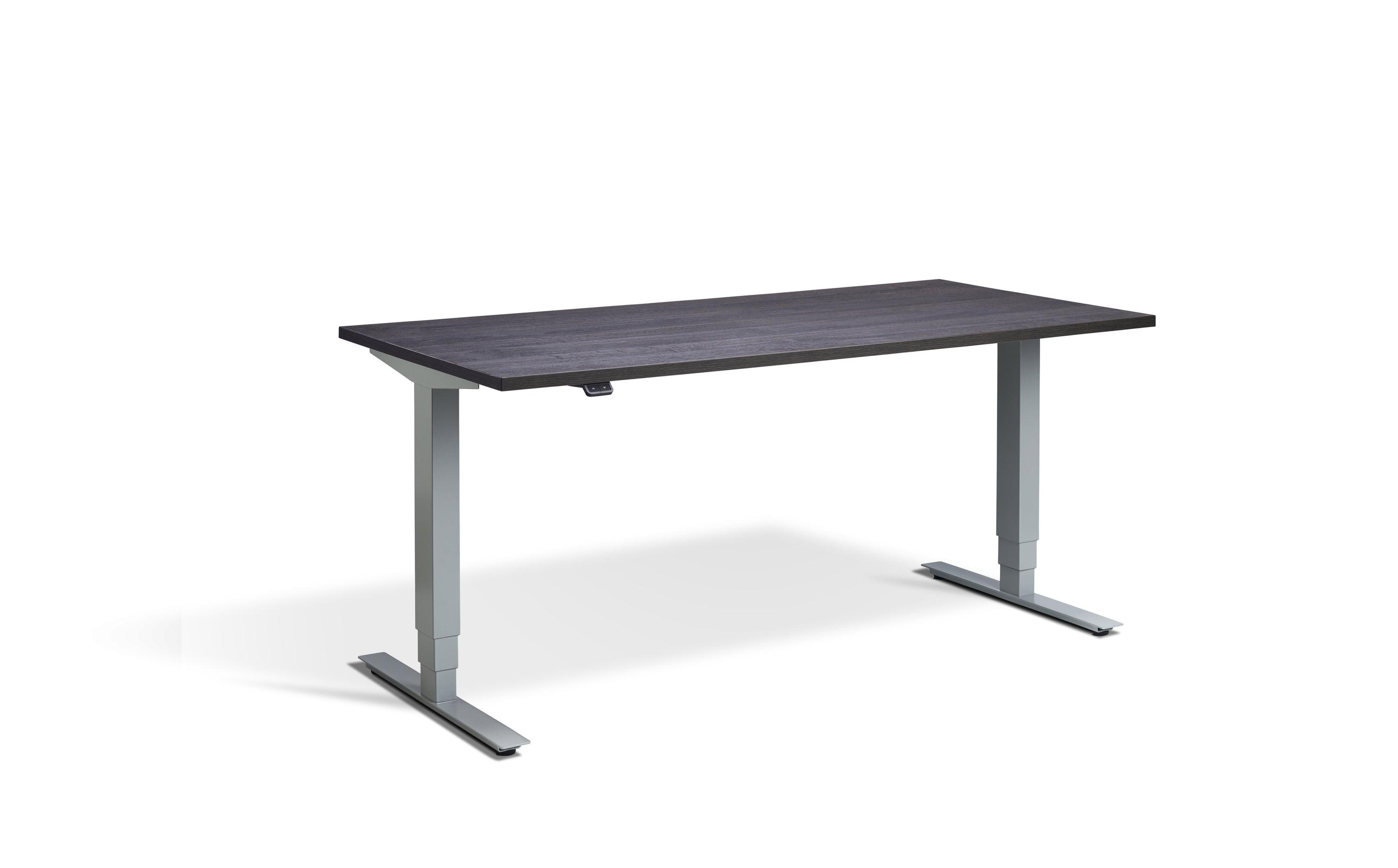 a desk with a black top and silver legs