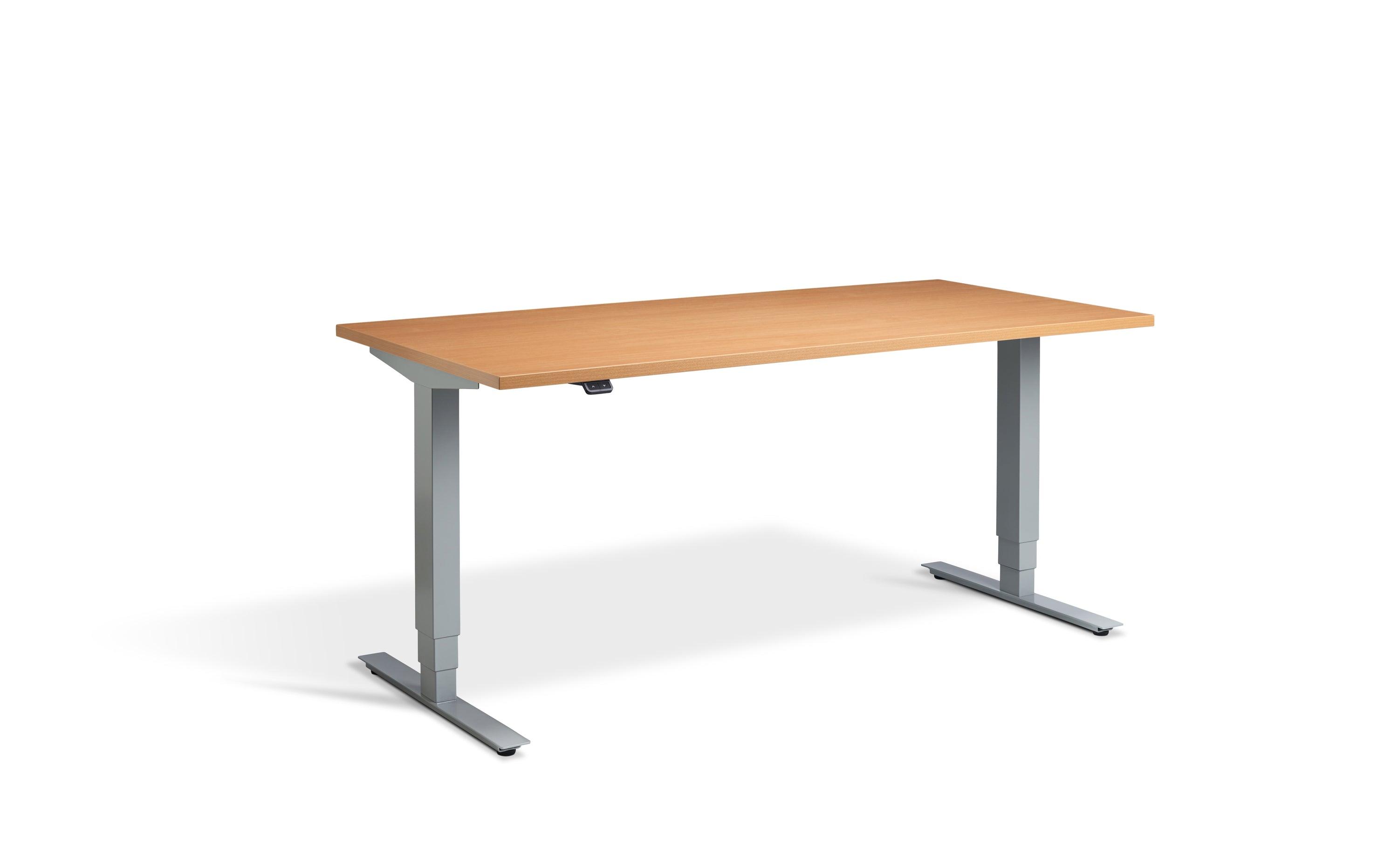 a wooden desk with metal legs on a white background