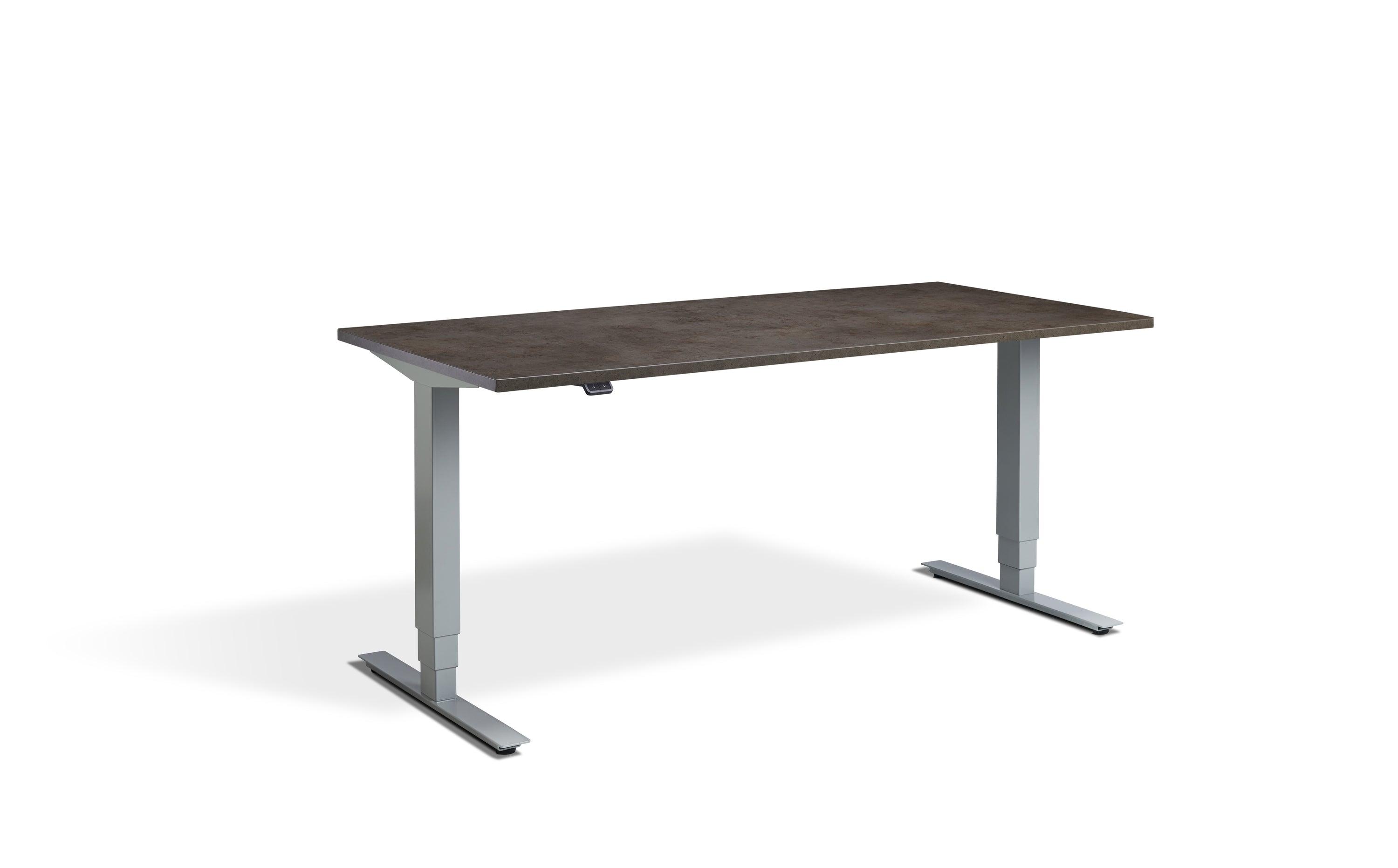 a wooden desk with metal legs on a white background