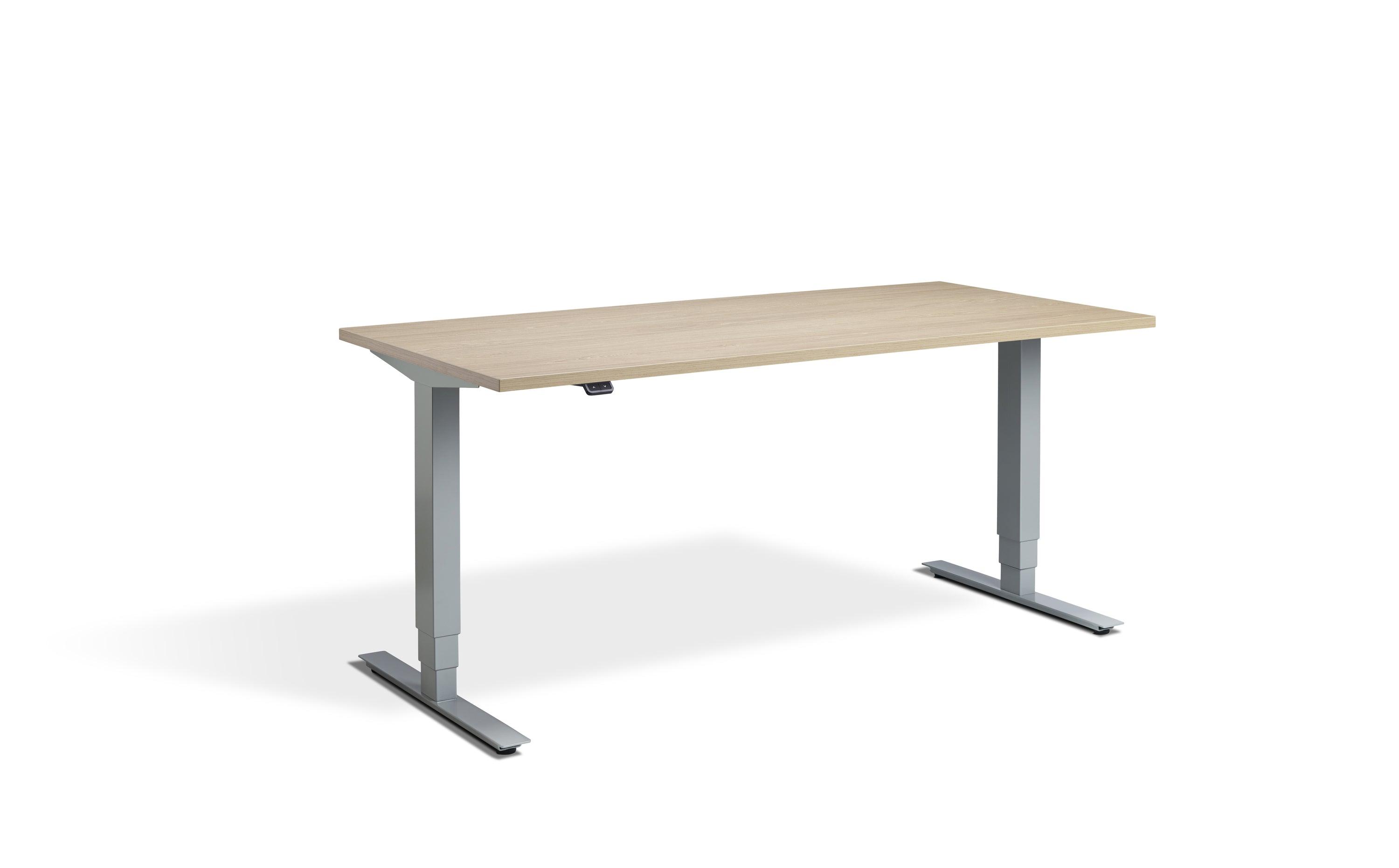 a wooden desk with metal legs on a white background