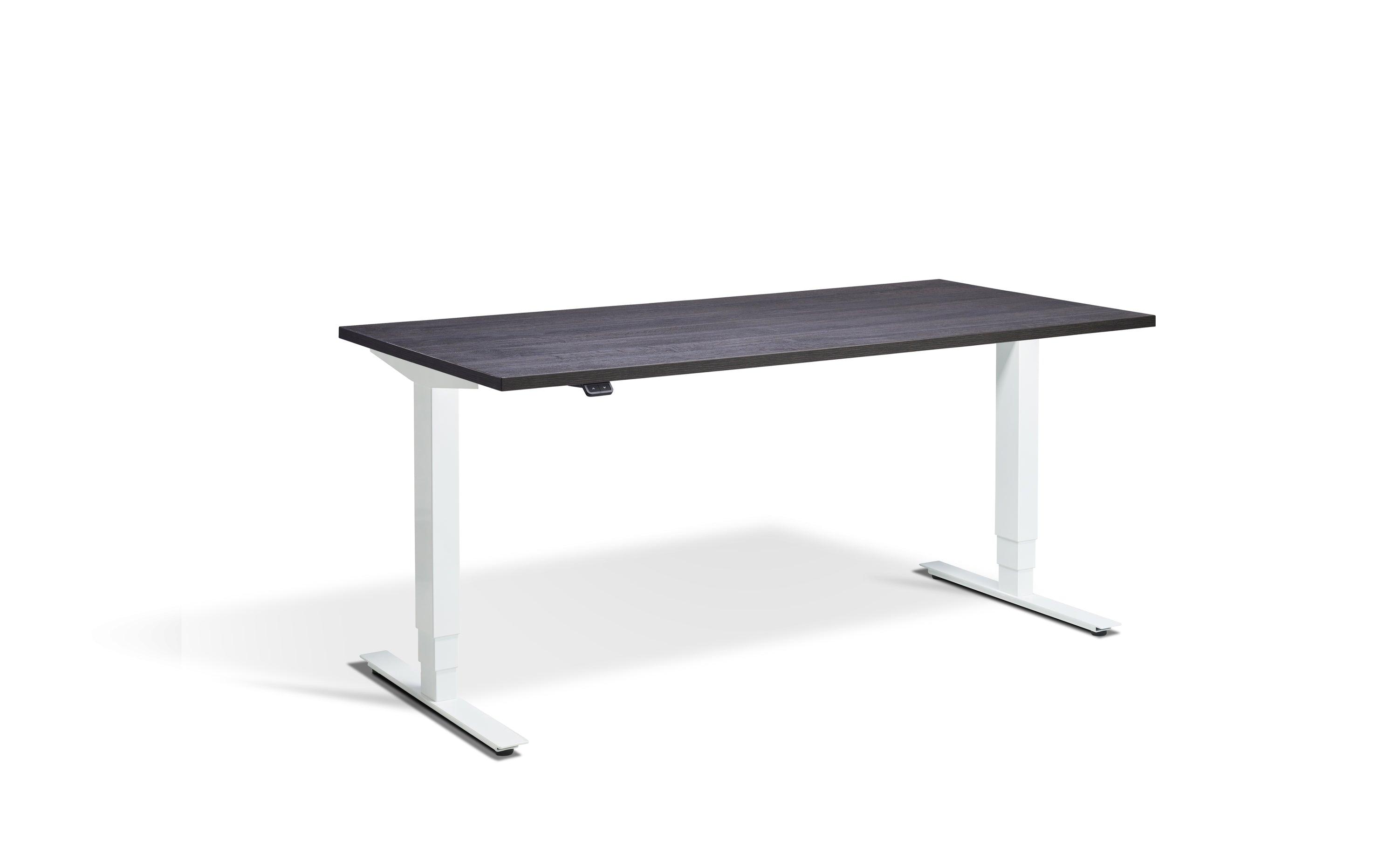 a desk with a black top and white legs