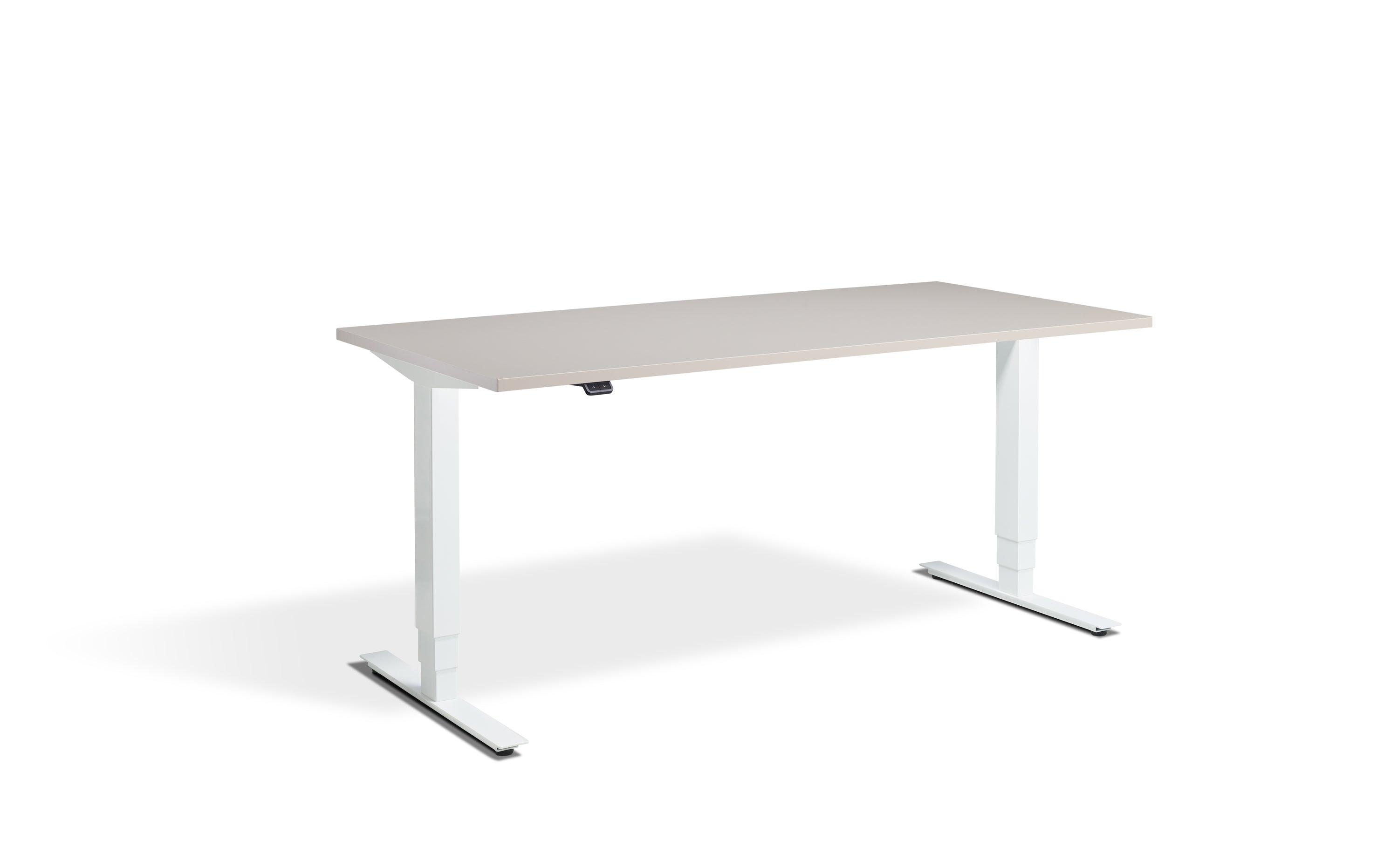 a desk with a white top and silver legs