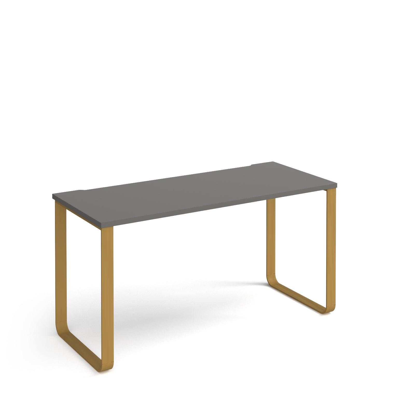 a grey table with gold legs on a white background