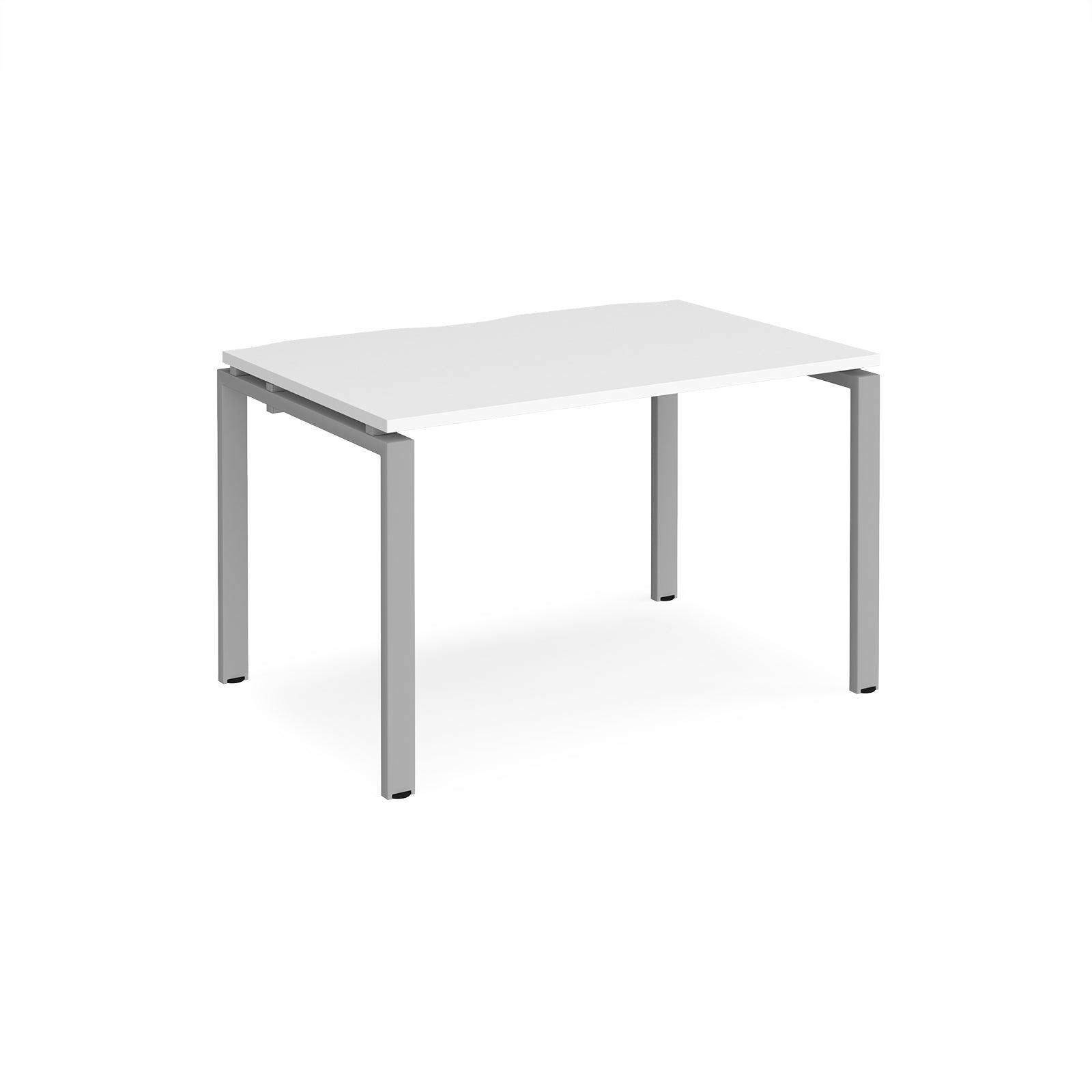 a white table sitting on top of a white floor