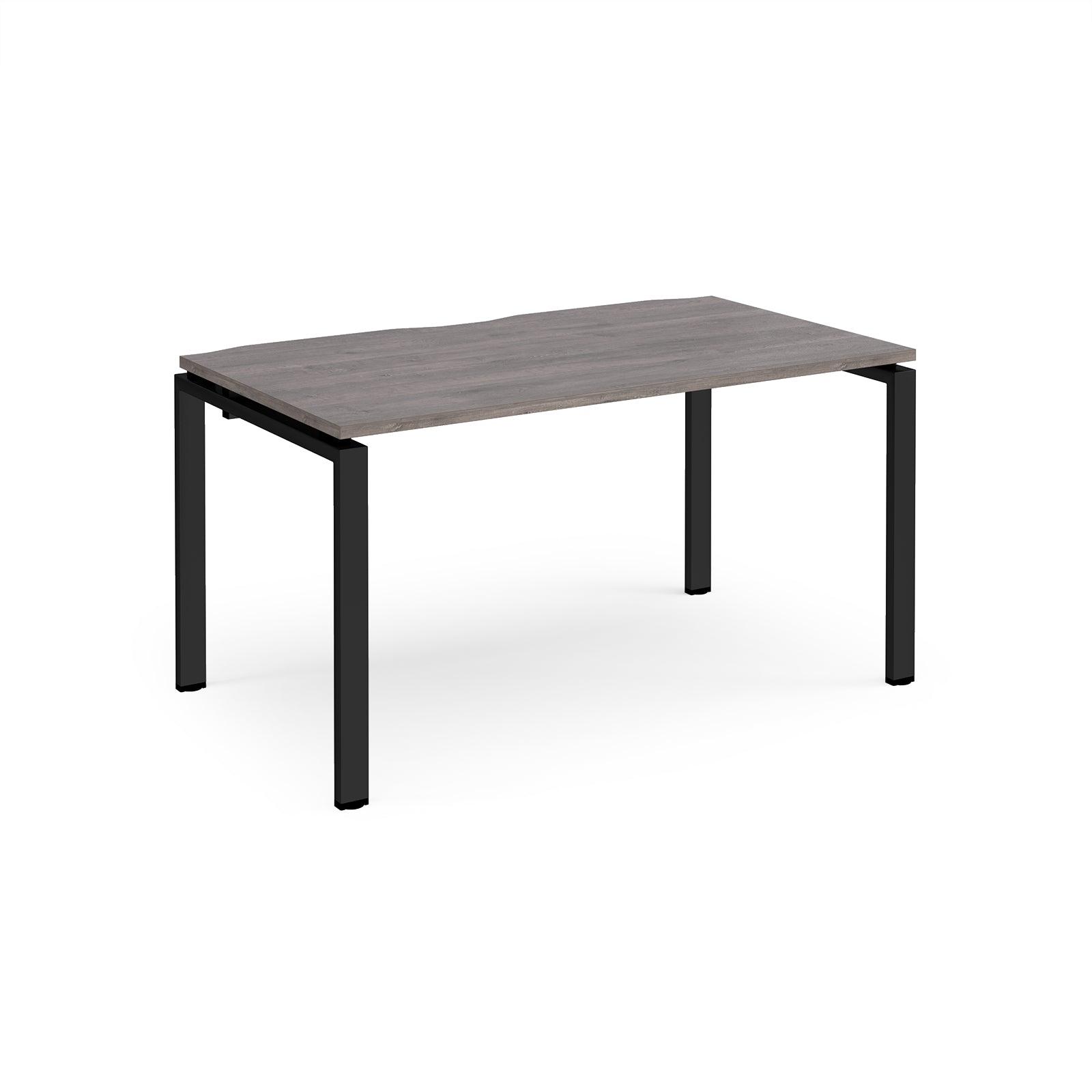 a table with black legs and a wooden top