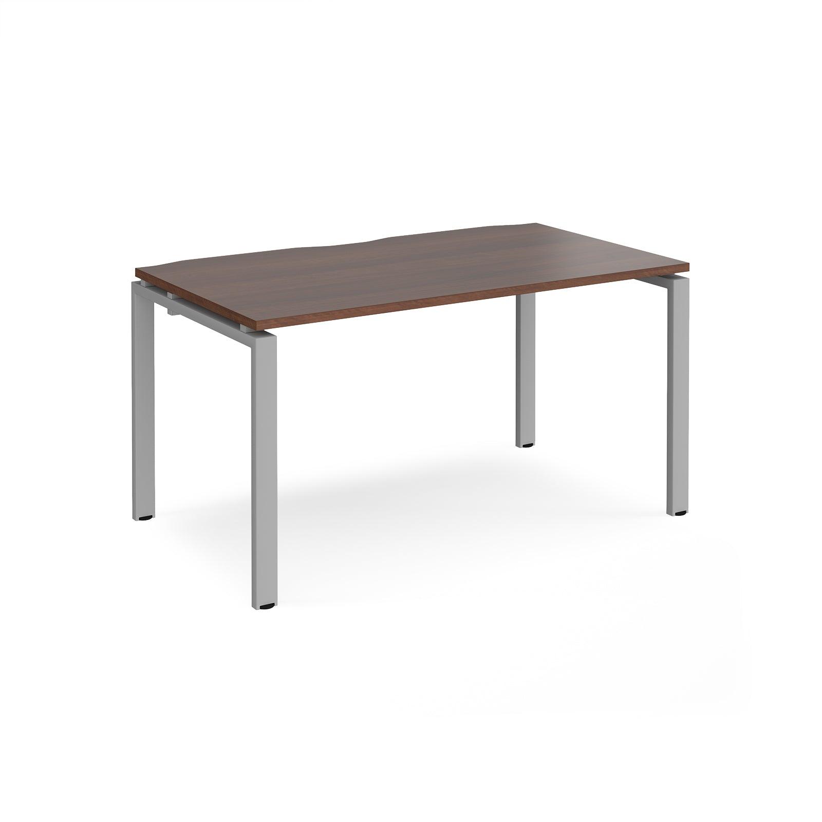 a wooden table with metal legs on a white background