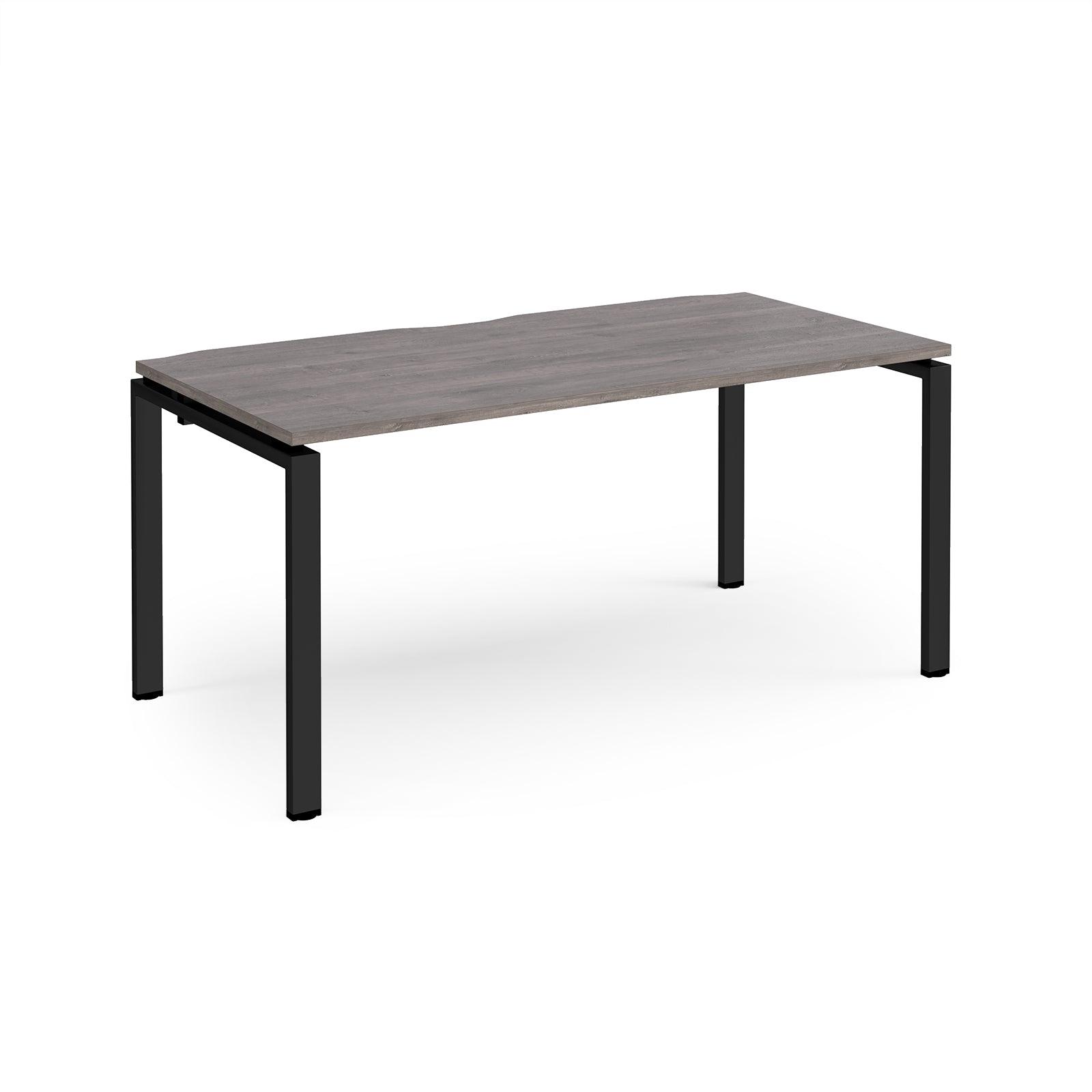 a table with black legs and a wooden top