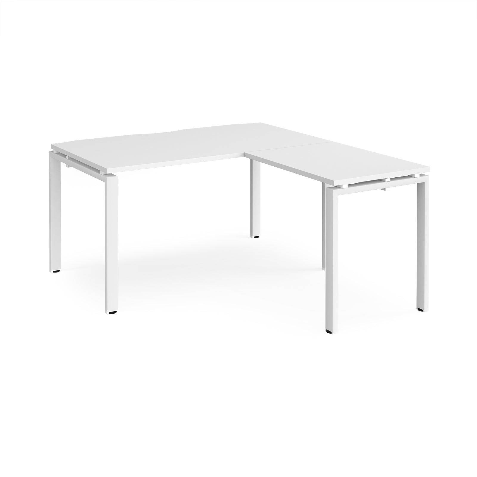 a white table sitting on top of a white floor