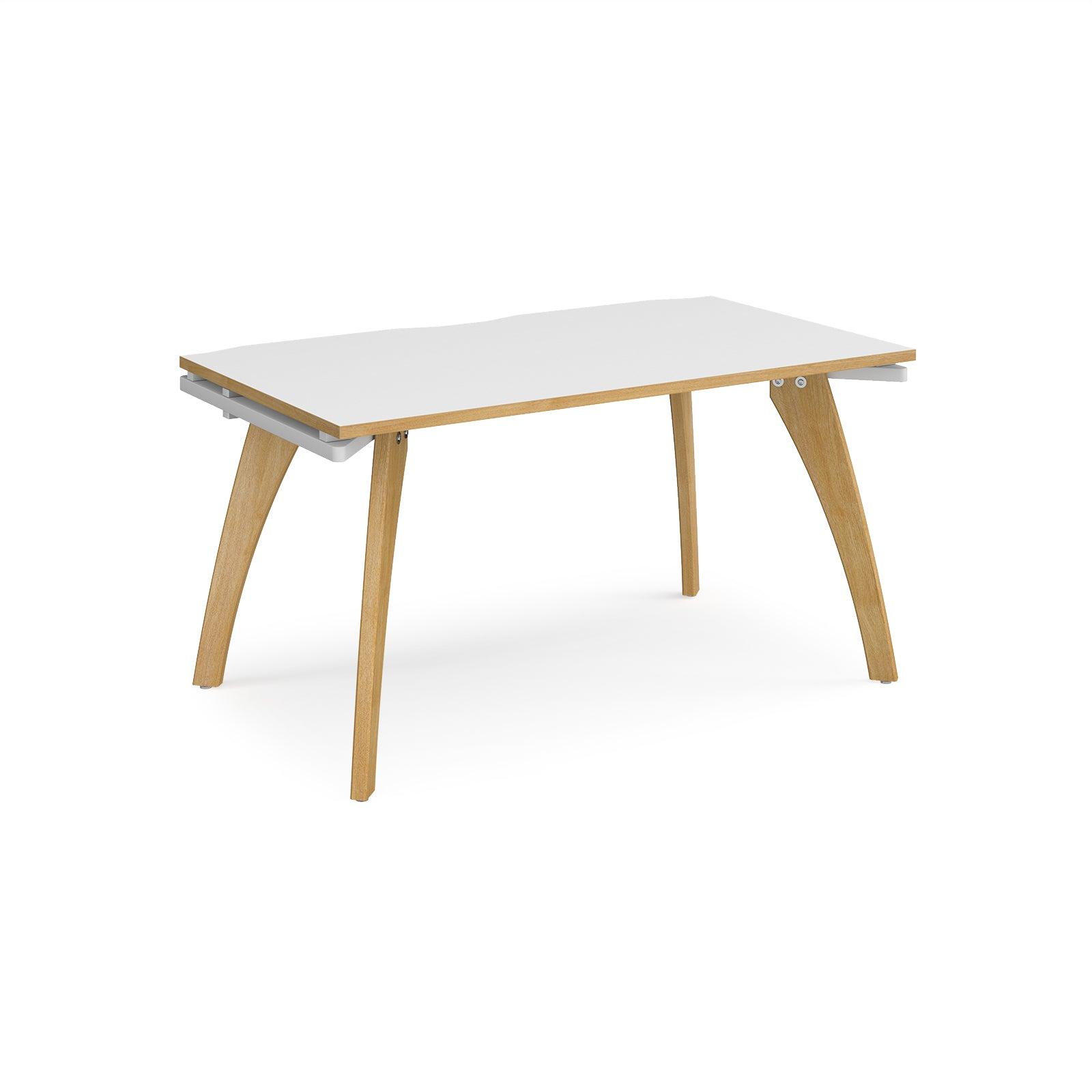 a white table with wooden legs on a white background